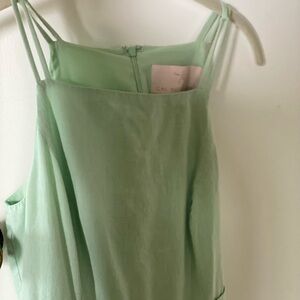 Gal Meets Glam pistachio green dress.